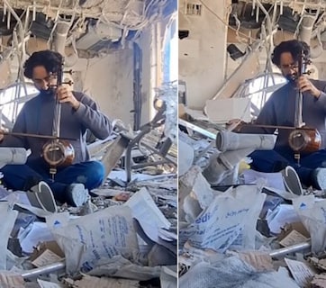 बमबारी के बीच मलबे में बैठा म्यूजिक टीचर, बजाई ऐसी धुन कि आंखें नम हो जाएं, ईरानी शिक्षक का Video वायरल