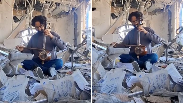 बमबारी के बीच मलबे में बैठा म्यूजिक टीचर, बजाई ऐसी धुन कि आंखें नम हो जाएं, ईरानी शिक्षक का Video वायरल