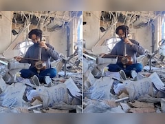 बमबारी के बीच मलबे में बैठा म्यूजिक टीचर, बजाई ऐसी धुन कि आंखें नम हो जाएं, ईरानी शिक्षक का Video वायरल