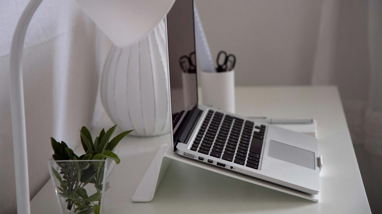 Explore the hidden health benefits of using a laptop stand