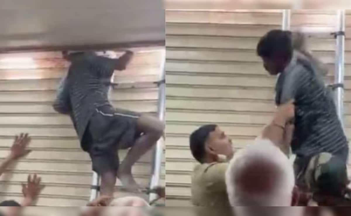 आसमान से गिरे खजूर में अटके...चोरी करने आए बंदे की शटर में फंसी गर्दन, रातभर हवा में झूलता रहा चोर