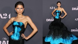 Zendaya Serves 'The Drama' In A Strapless Blue-Black Gown With Feathered Flair
