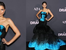 Zendaya Serves 'The Drama' In A Strapless Blue-Black Gown With Feathered Flair