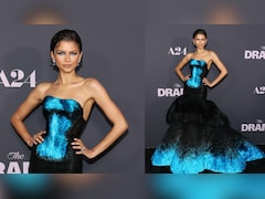 Zendaya Serves 'The Drama' In A Strapless Blue-Black Gown With Feathered Flair