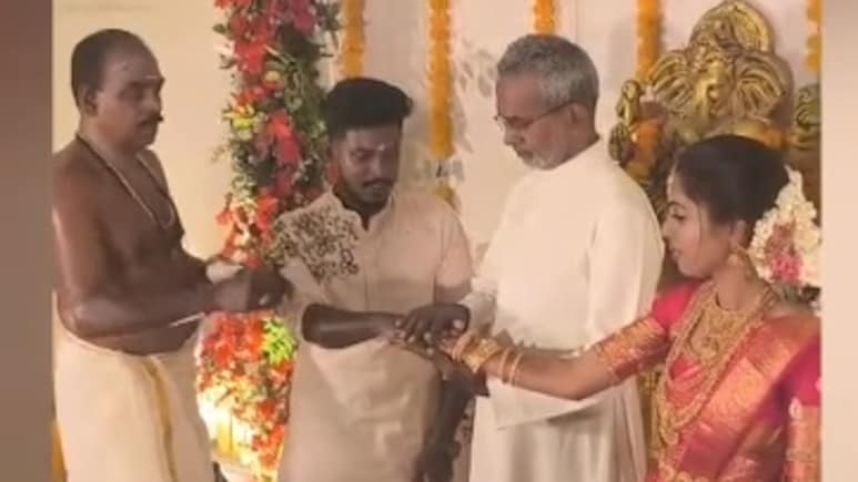 WATCH: Christian Priest Wins Hearts Performing 'Kanyadaan' For Hindu Bride He Raised In Kerala Wedding