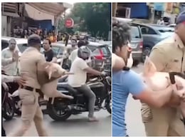 VIDEO: ठाणे की सोसायटी में बकरे के विरोध में सुअर लेकर घुसने की कोशिश, पुलिसकर्मी ने प्रदर्शनकारी से छीना
