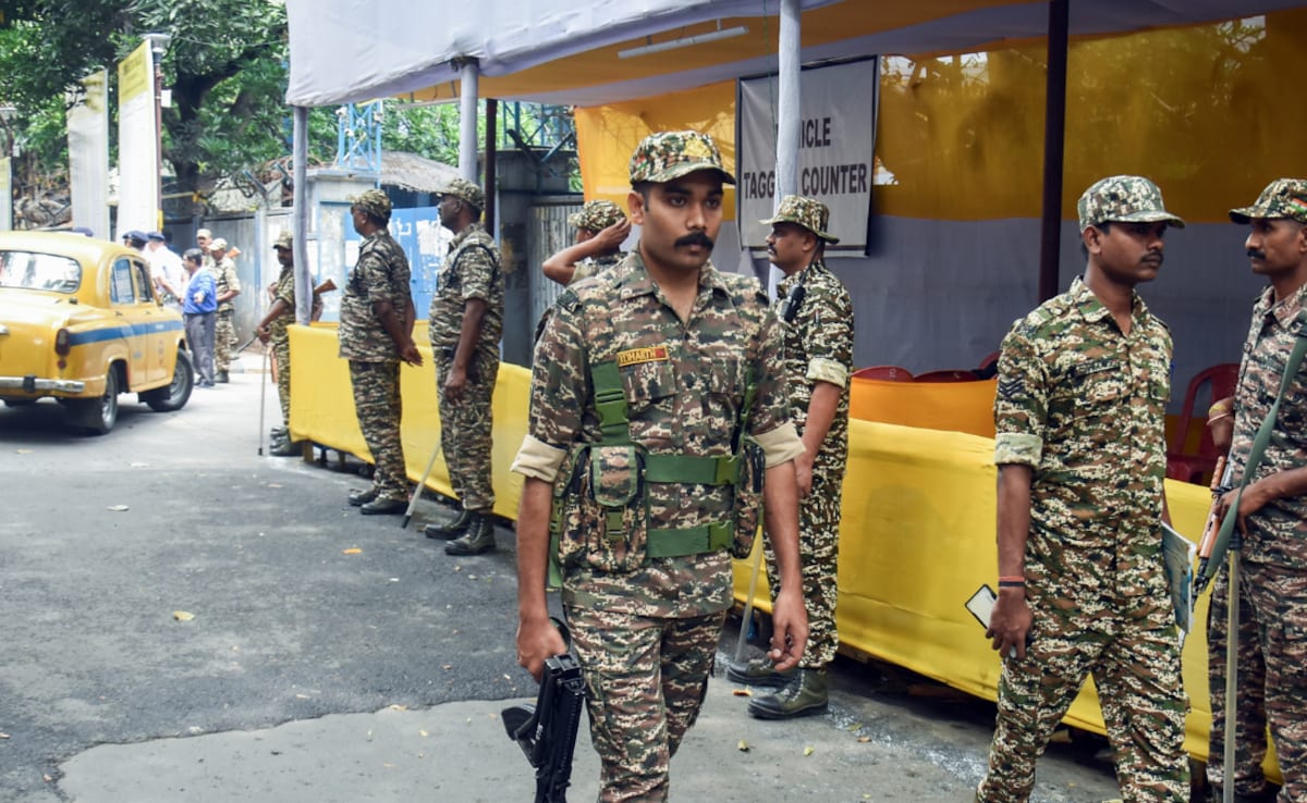 Security personnel at a strong room at the Bhabanipur assembly constituency in Kolkata.