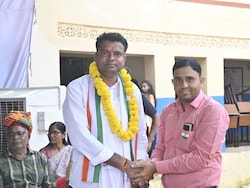 BJP vs Congress Over NEET Paper Leak Accused Dinesh Biwal's Political Links