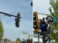 गजब! BMW से ऐसी भिड़ंत कि दूर हवा में खंभे पर जा लटकी मोटरसाइकिल, हादसे का VIDEO देख लोग हैरान