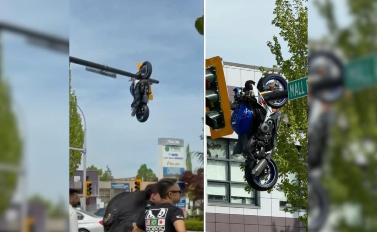 गजब! BMW से ऐसी भिड़ंत कि दूर हवा में खंभे पर जा लटकी मोटरसाइकिल, हादसे का VIDEO देख लोग हैरान