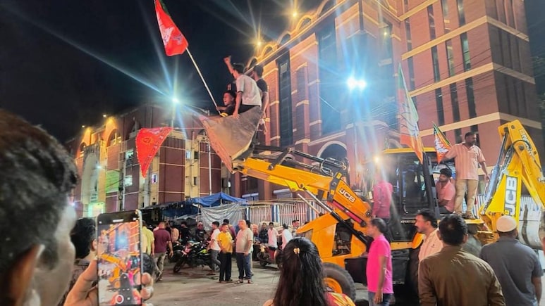 Bulldozer In Kolkata's New Market, Trinamool Claims Party Office Vandalised