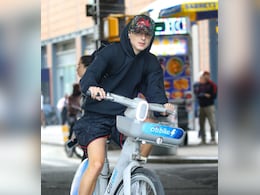 Timothee Chalamet Soaks Up The Sunny Weather As He Bikes Around New York City