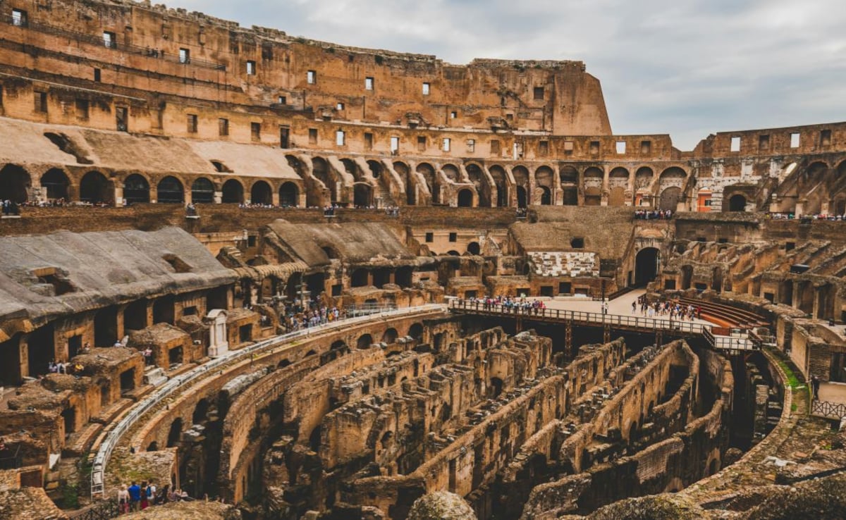 The Colosseum is an enormous ancient amphitheatre located in central Rome. The Colosseum is an enormous ancient amphitheatre located in central Rome.