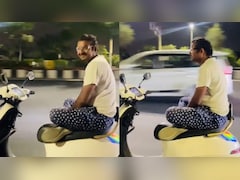 लखनऊ में खतरनाक स्टंट, चलती स्कूटी पर हाथ-पैर मोड़कर बैठा युवक, वीडियो वायरल