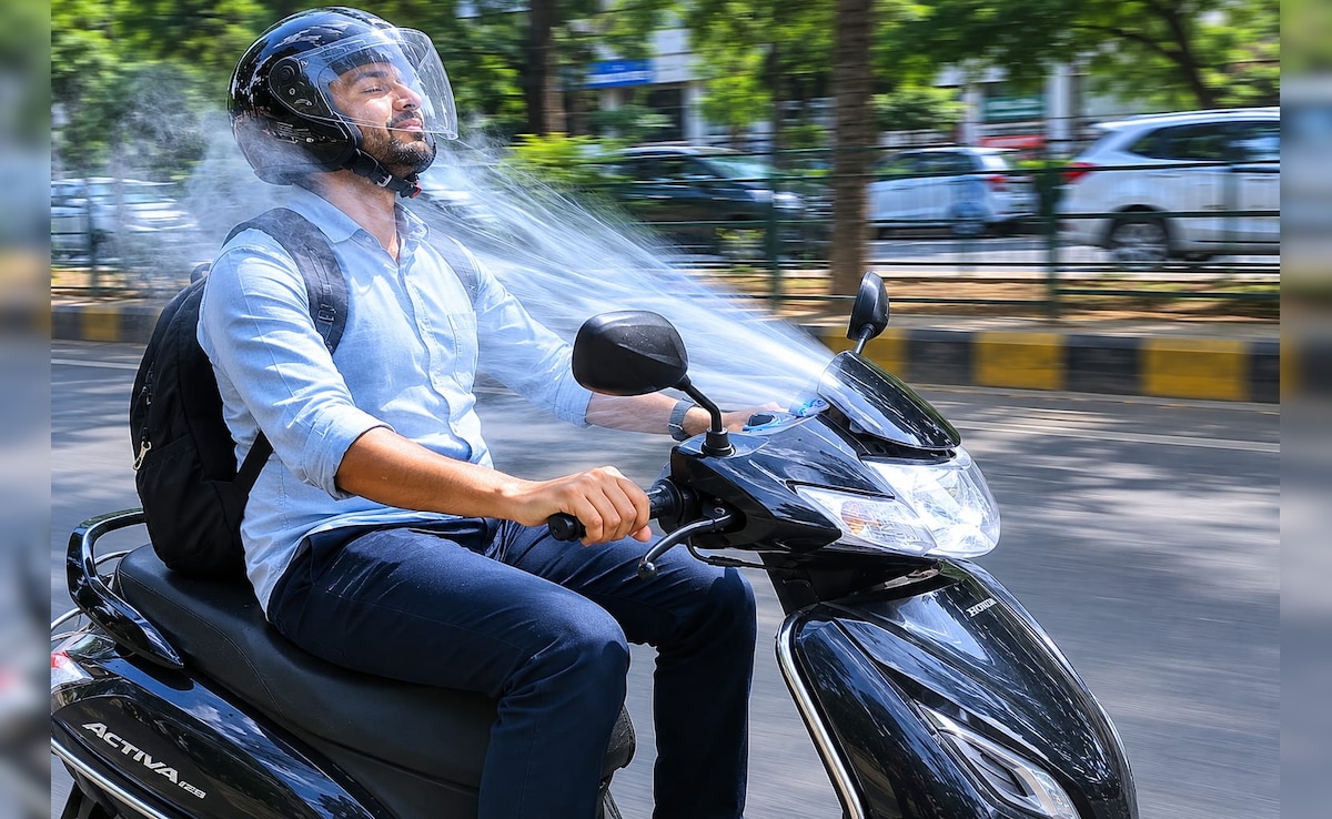 स्कूटी बनी चलती-फिरती AC, गर्मी से बचने के लिए शख्स ने लगाया ऐसा तगड़ा जुगाड़, धड़ल्ले से वायरल हुआ VIDEO