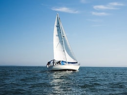 US Couple Quits Corporate Jobs For "First Retirement" At 30, Buys A Sailboat To Explore The World