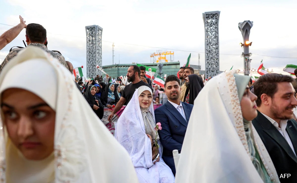 Iran Stages Mass Weddings For Couples Ready For War "Sacrifice"