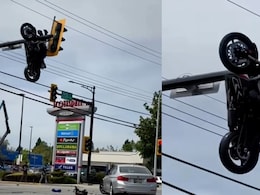 Watch: Canada Road Accident Gets Suzuki GSXR Hung OnTraffic Signal In A Strange Manner