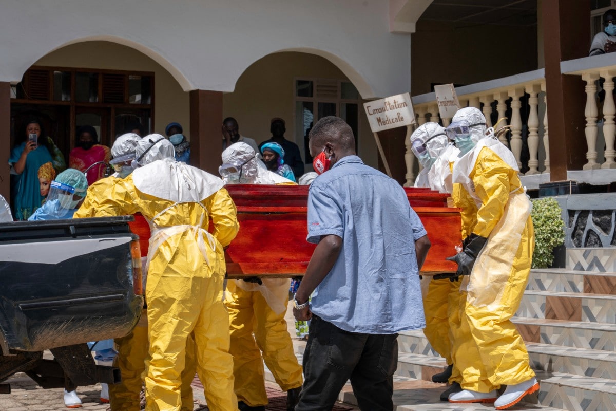 The coffin of a person suspected of having died from Ebola is carried onto a pick up truck by health worker at a hospital in Bunia, in the eastern Democratic Republic of the Congo, on May 25, 2026. The coffin of a person suspected of having died from Ebola is carried onto a pick up truck by health worker at a hospital in Bunia, in the eastern Democratic Republic of the Congo, on May 25, 2026.