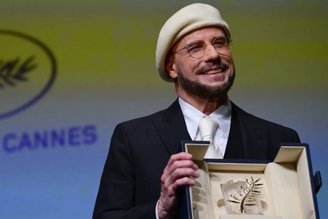 John Travolta On His Viral Beret Look At Cannes: &ldquo;I&rsquo;m Gonna Do An Homage To Being A Director&rdquo;