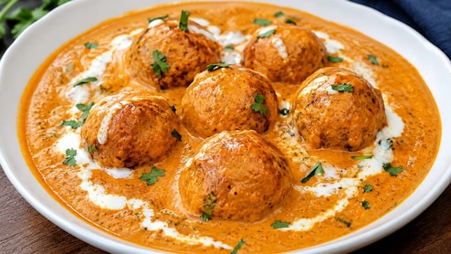 Malai Kofta: मलाई कोफ्ता का नाम सुनते ही क्यों आ जाता है मुंह में पानी? जानिए कैसे पड़ा इस शाही डिश का नाम