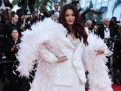 Aishwarya Rai Owns Cannes Closing In An All-White Power Suit And Feather Boa