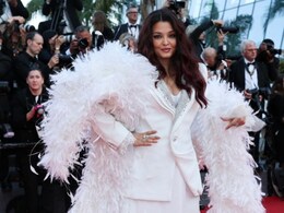 Aishwarya Rai Owns Cannes Closing In An All-White Power Suit And Feather Boa