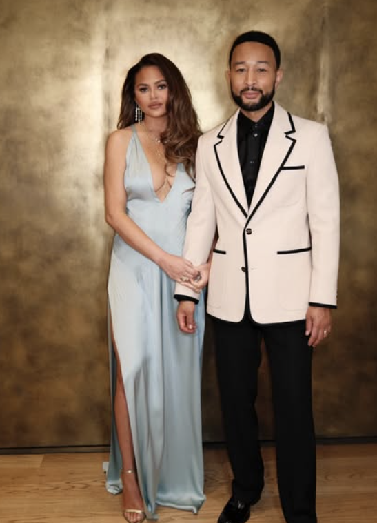 John Legend Helps Chrissy Teigen After Wardrobe Malfunction At 2026 AMAs