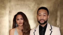 John Legend Helps Chrissy Teigen After Wardrobe Malfunction At 2026 AMAs