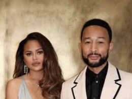 John Legend Helps Chrissy Teigen After Wardrobe Malfunction At 2026 AMAs