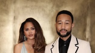John Legend Helps Chrissy Teigen After Wardrobe Malfunction At 2026 AMAs