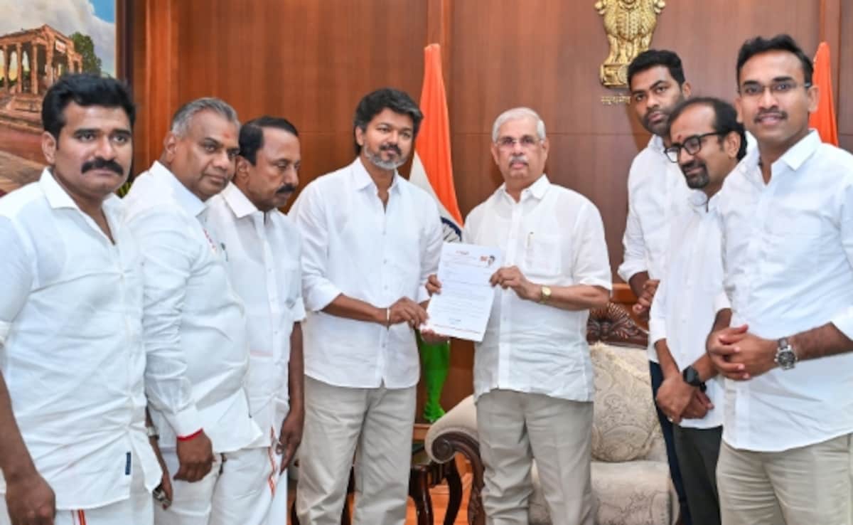 TVK chief Vijay with Tamil Nadu Governor Rajendra Vishwanath Arlekar at Lok Bhavan in Chennai on Wednesday