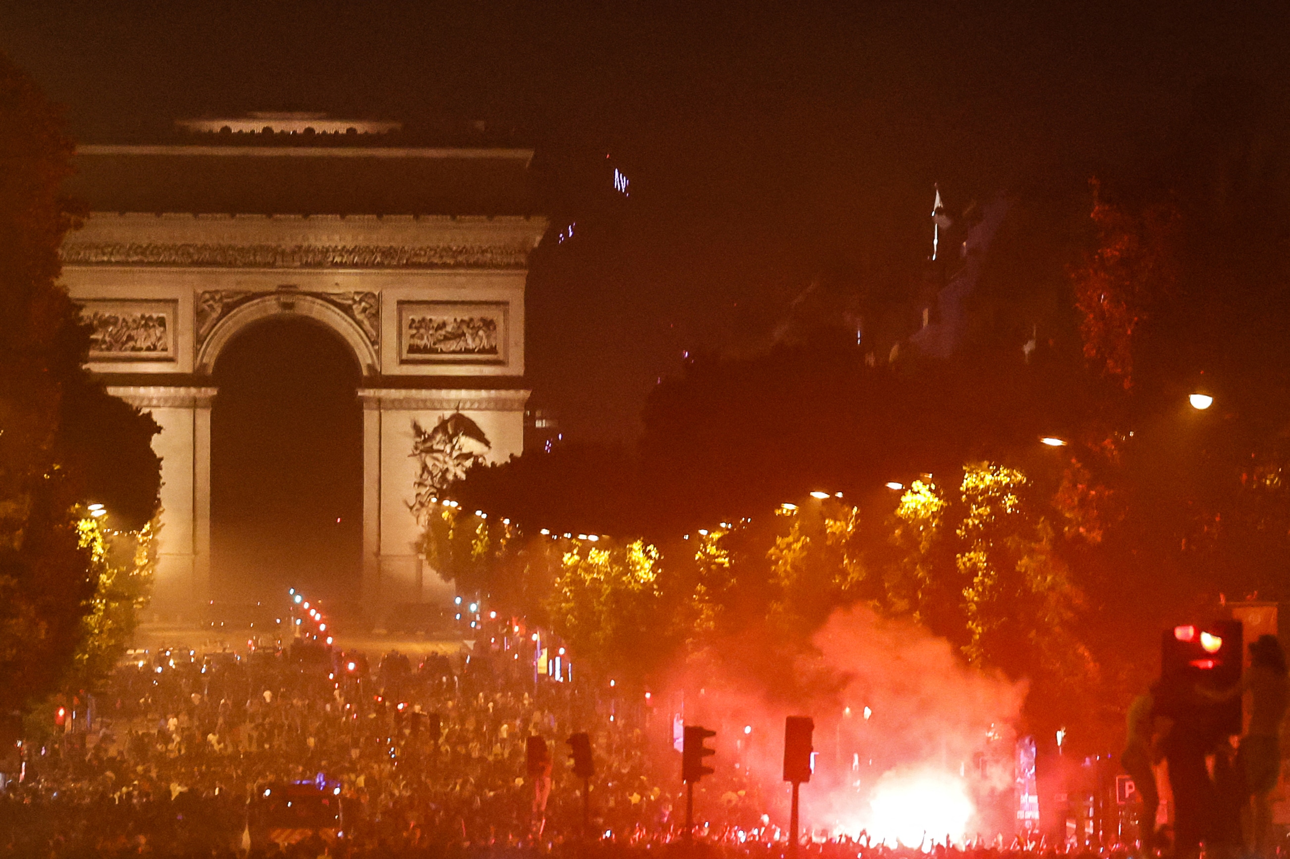 PSG supporters gather on the Champs-Elysees Avenue after the club won the UEFA Champions League final between Paris Saint-Germain (PSG) and Arsenal FC played in Budapest, in Paris on May 30, 2026. PSG supporters gather on the Champs-Elysees Avenue after the club won the UEFA Champions League final between Paris Saint-Germain (PSG) and Arsenal FC played in Budapest, in Paris on May 30, 2026.