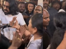 Viral Video: Ram Charan Left Shocked As Female Fan Breaches Security At <i>Peddi</i> Event