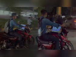 'Work From Bike': Hyderabad Man Spotted With Laptop On Fuel Tank Of Vehicle, Video Viral