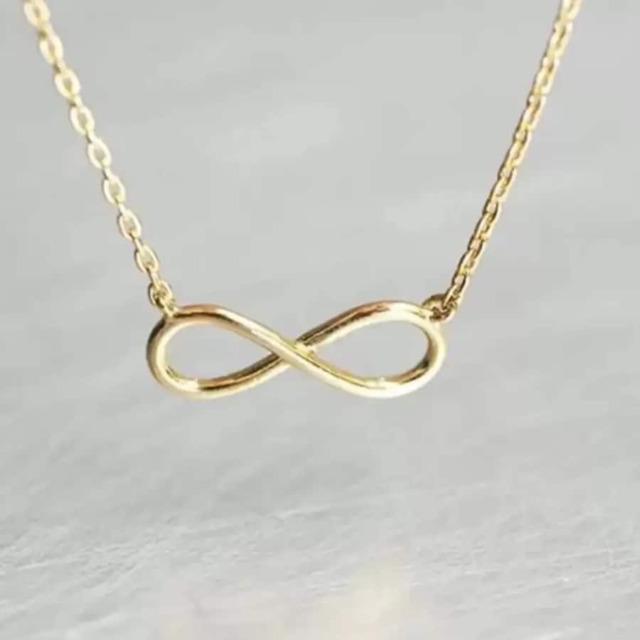 Click here to buy: Zebisco Charming Gold Plated Infinity Pendant Necklace