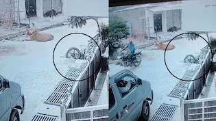 खुले नाले में बाइक सहित समा गया युवक, घटना CCTV में कैद; लोगों ने सुरक्षित बाहर निकाला