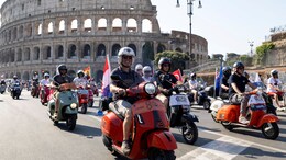 10,000 Vespas Swarm Rome's Historic Sites To Mark Scooter's 80th Anniversary