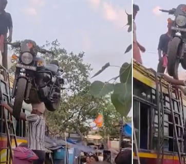 ये है असल जिंदगी का बाहूबली, सिर पर बुलेट बाइक उठाकर किया ऐसा काम, वीडियो देख दंग रह गए लोग