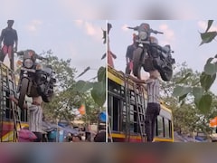 ये है असल जिंदगी का बाहूबली, सिर पर बुलेट बाइक उठाकर किया ऐसा काम, वीडियो देख दंग रह गए लोग