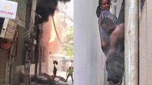 मालवीय नगर आग: जान बचाने के लिए होटल की बिल्डिंग से कूदी महिला, वीडियो