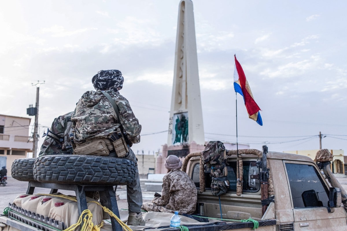 Soldiers from the National Front for the Liberation of Azawad (FLA) sit on a pick-up truck as they patrol the streets of Kidal.