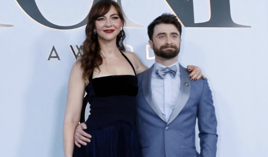 Daniel Radcliffe And Erin Darke Pose Together On The Red Carpet At The 79th Tony Awards