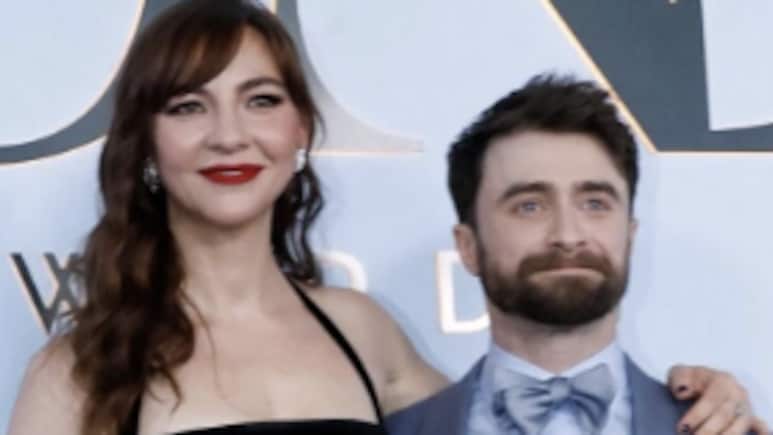 Daniel Radcliffe And Erin Darke Pose Together On The Red Carpet At The 79th Tony Awards