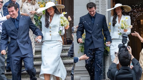 Dua Lipa Opts For Schiaparelli Skirt Suit And Bvlgari Necklace For London Wedding With Callum Turner