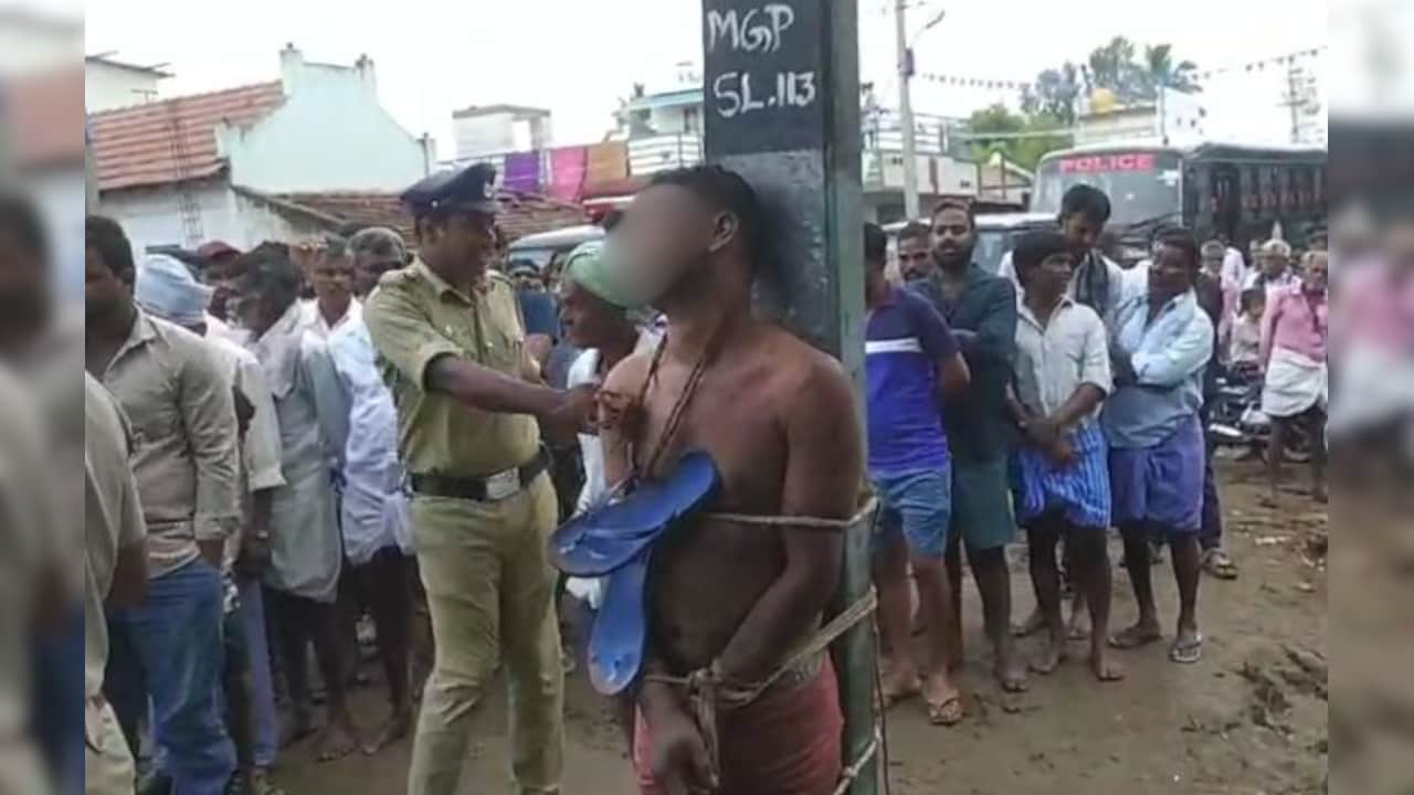बाबा साहब की तस्वीर को खराब करने की कोशिश, आरोपी को खंभे से बांधकर पहनाई चप्पल की माला