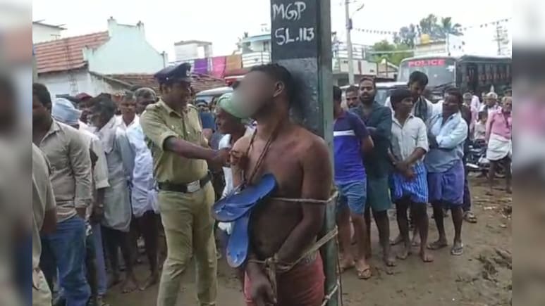 बाबा साहब की तस्वीर को खराब करने की कोशिश, आरोपी को खंभे से बांधकर पहनाई चप्पल की माला