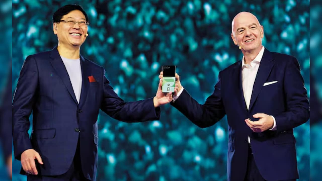 Lenovo chairman Yang Yuanqing and FIFA president Gianni Infantino Lenovo chairman Yang Yuanqing and FIFA president Gianni Infantino