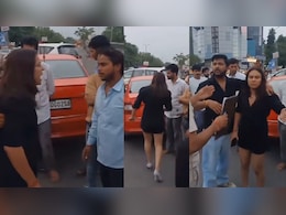 स्कोडा कार सवार महिला का बीच सड़क हंगामा, टैक्सी ड्राइवर से गाली-गलौज और हाथापाई का आरोप