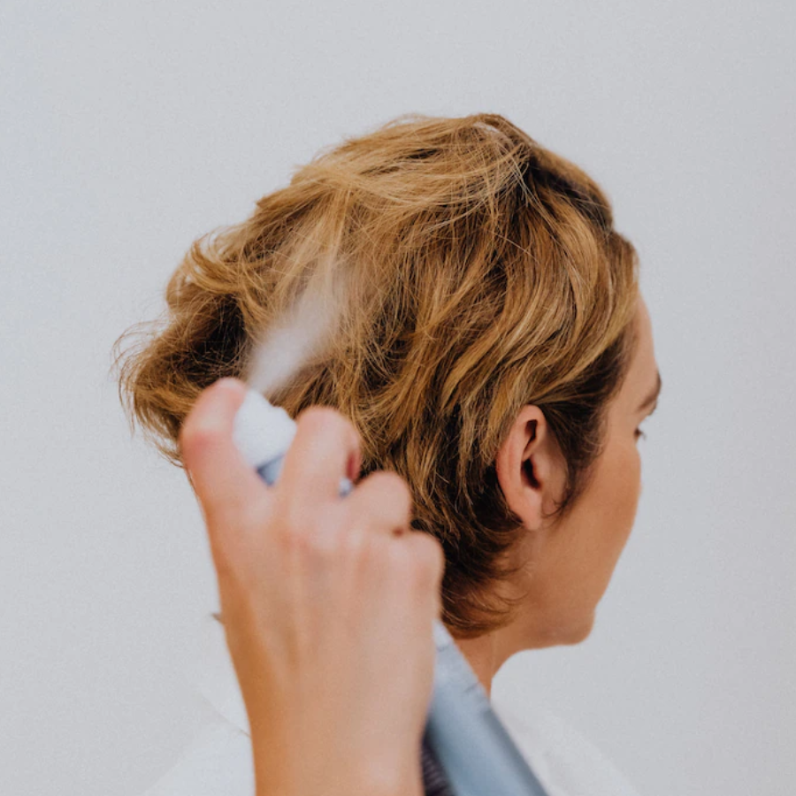 What Is Dry Shampoo And How To Use It Without Ruining Your Hair